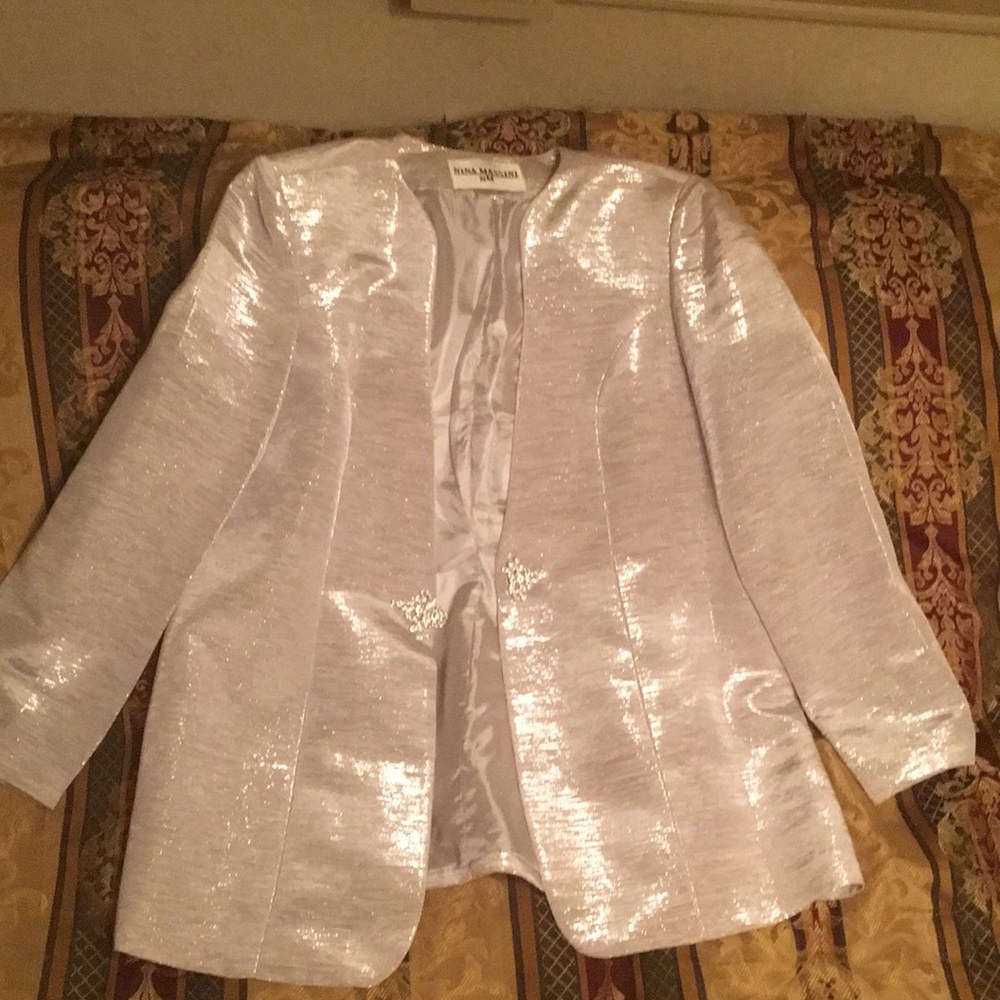 3 pc silver suit with designs in the tail